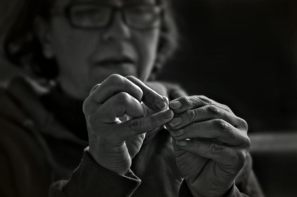 Moroccan woman threading