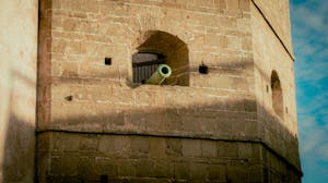 Free Photo Of Historic Cannon In Moroccan Stone Fort Wall