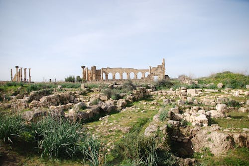 Free Explore the historic ruins of Volubilis, an ancient Roman city in Morocco. Stock Photo
