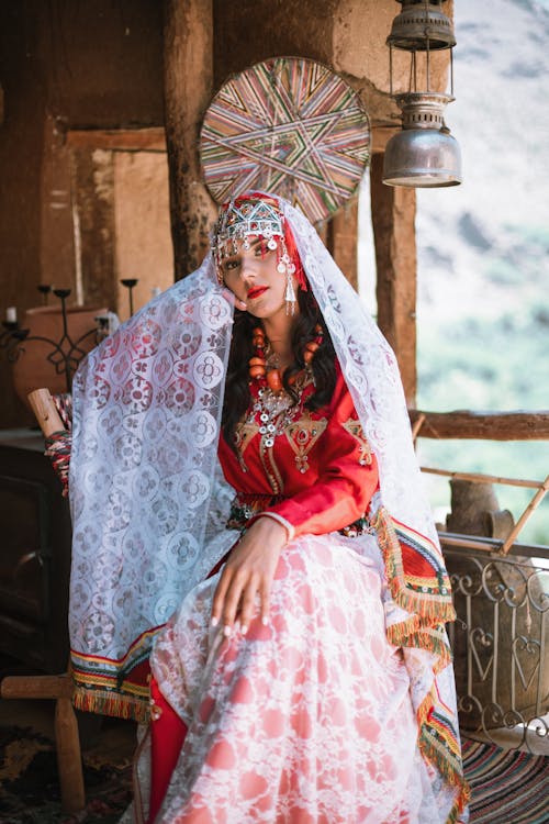 Free A Moroccan Berber woman in traditional costume with intricate jewelry and headdress. Stock Photo