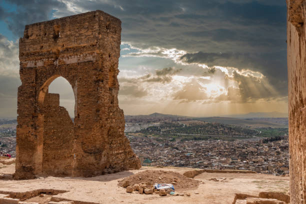 Panoramic view of the Merinid Tombs in Morocco, showcasing ancient ruins perched on a hill overlooking Fez's medina.