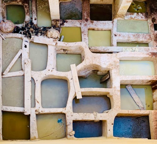 Free Aerial view of colorful traditional tanneries with vats filled with natural dyes. Stock Photo