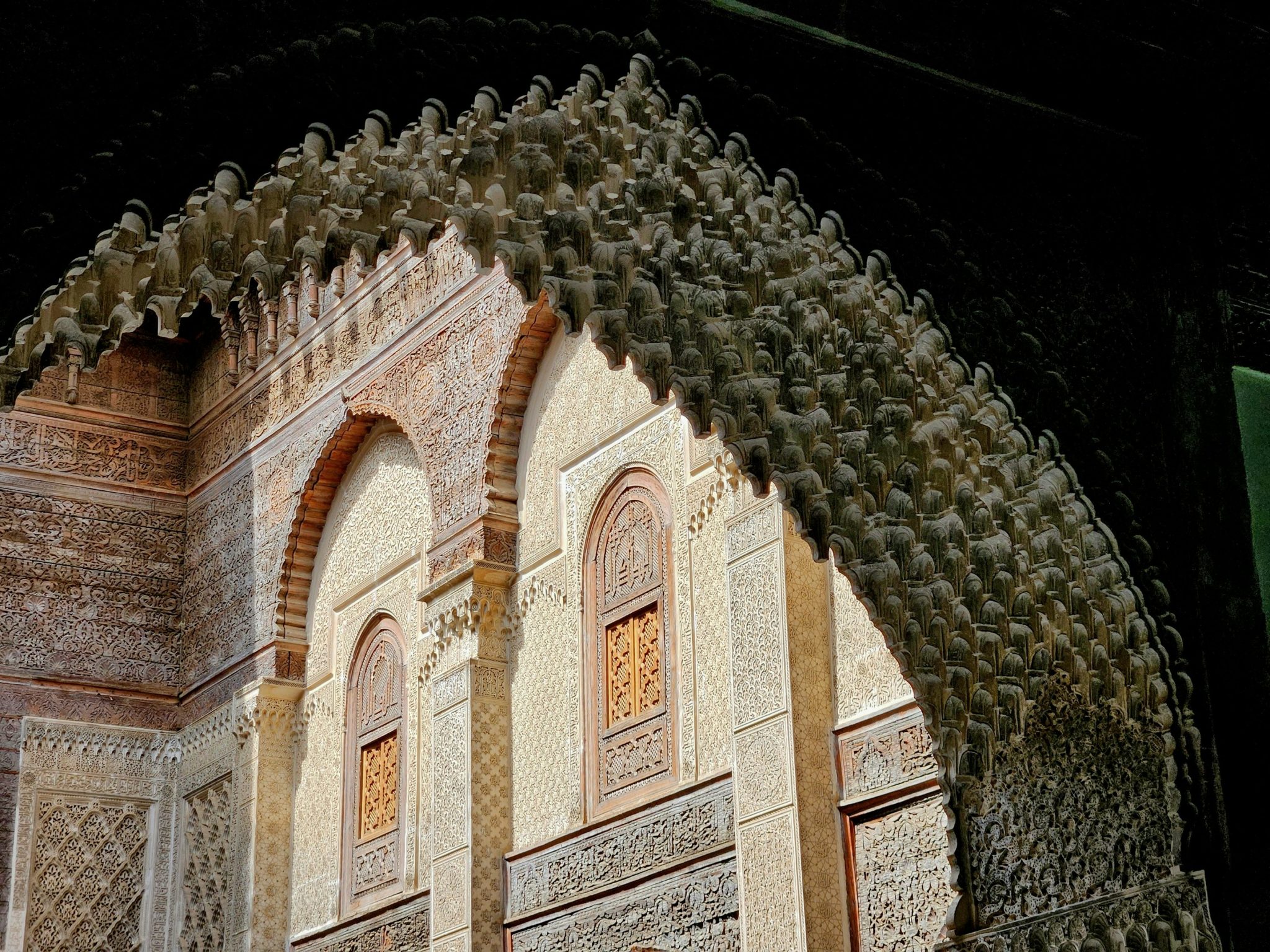An arch in a building with a clock on it