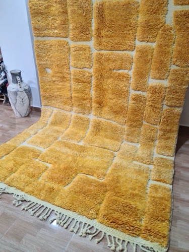 Close-up of ethical Mrirt rug texture, showing sustainable craftsmanship